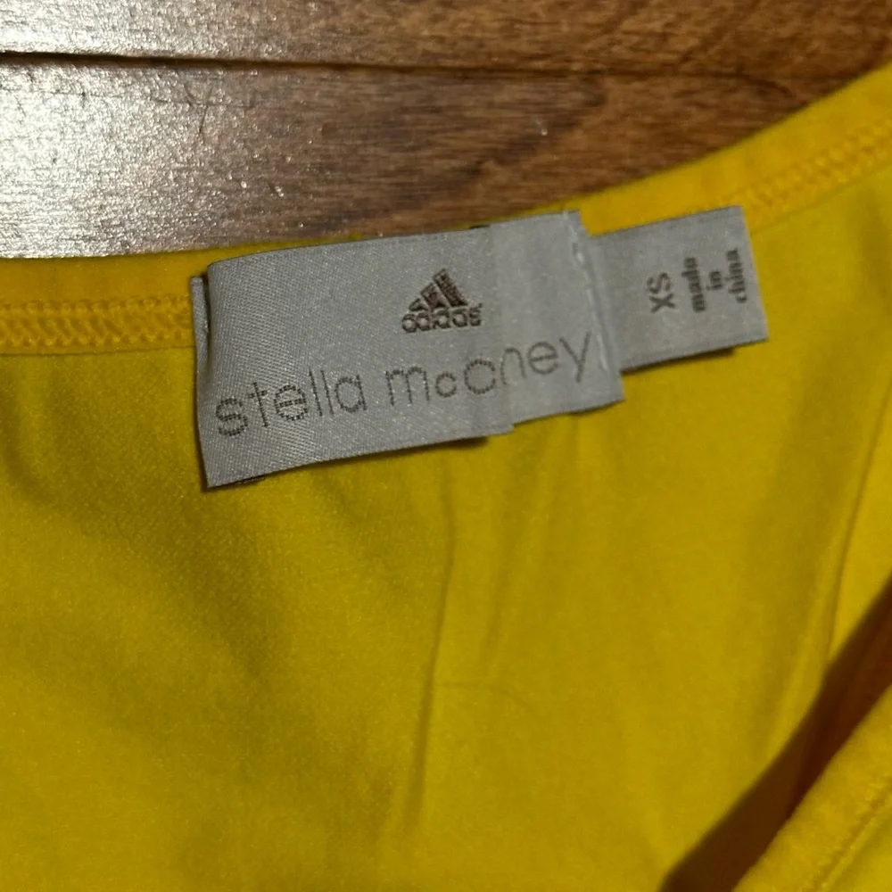 Workout clothing set: Alo Yoga, Adidas by Stella McCartney, Nike, Michi